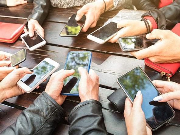 Young people using smartphones